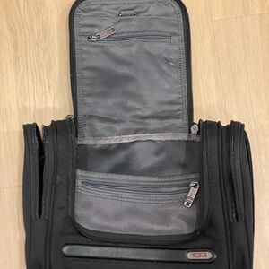 Tumi Black Toiletry Bag with Durable Material and Hanging Feature